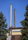 Two metal chimneys