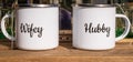 Two with metal cups with black wedding writings