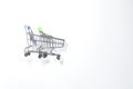 Two metal grocery baskets on a light background. Royalty Free Stock Photo