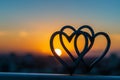 Two metal hearts lie on top of a table, creating a striking visual contrast against the surface, A minimalist, abstract image of