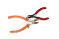 Two metal old rusty pliers with red and orange handle Royalty Free Stock Photo