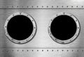 Two metal ship portholes Royalty Free Stock Photo