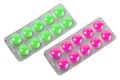 Two metallic blister with purple and green pills Royalty Free Stock Photo
