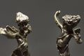 Two metallic dancing angels, dance with them