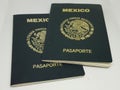 Two Mexican passports in a white background Royalty Free Stock Photo