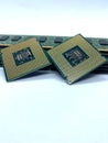 Two microprocessors on a stack of RAM memory closeup isolated on white background Royalty Free Stock Photo