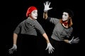 Two mimes and invisible wall Royalty Free Stock Photo