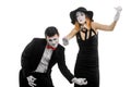 Two mimes playing music instruments Royalty Free Stock Photo