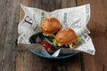 Two mini beef burgers with beetroot relish