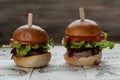 Two mini beef burgers with beetroot relish