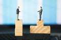 Two miniature businessmen shaking hands Royalty Free Stock Photo