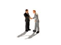 Two miniature figures of businessmen Royalty Free Stock Photo