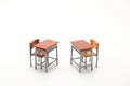 Two Miniature School Desks On White Background.
