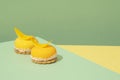 yellow-colored sweet treats set atop a blue and yellow-patterned tabletop