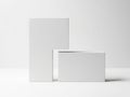 Two minimalist white boxes standing against a plain white background Royalty Free Stock Photo