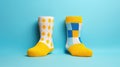 Two mismatched socks on a colorful yellow and light blue geometric shape background, an ode to individuality. Ai Generated