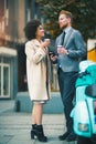 Two mixed race business people talking outside company Royalty Free Stock Photo