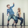 Couple of young man and woman dancing hip-hop Royalty Free Stock Photo