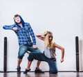 Couple of young man and woman dancing hip-hop Royalty Free Stock Photo