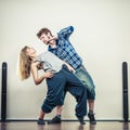 Couple of young man and woman dancing hip-hop Royalty Free Stock Photo