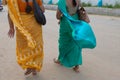 Two Modern Indian woman in a beautiful traditional saree