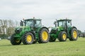 Two modern John Deere tractor parked at a show Royalty Free Stock Photo