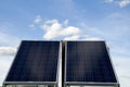 Two Modern Solar Panel with Blue Sky on a Small Farm Royalty Free Stock Photo