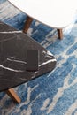 Two modern stool made of black and white artificial stone Royalty Free Stock Photo