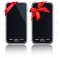 Two modern touch-screen mobile phones with ribbon Royalty Free Stock Photo