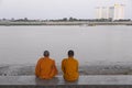 Two monks in Phnom Penh in late afternoon