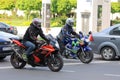 Two motorcyclists in traffic