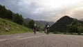 Two mountain bikers riding on bikes bikepacking style