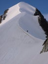 Two mountain climbers on the famous Bianco Ridge in Switzerland Royalty Free Stock Photo