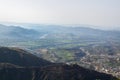 Two mountain ranges separating a city and a river bridge shot from a hill top. Hotel concept Royalty Free Stock Photo