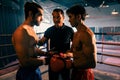 Two Muay Thai boxer with strong muscular body on the ring ready to fight.Impetus Royalty Free Stock Photo