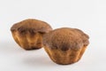 Two muffins with chocolate on a white background, isolated Royalty Free Stock Photo