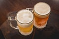 two mugs of chopp on the table. Royalty Free Stock Photo