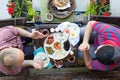 Two multi denominational men praying over food Royalty Free Stock Photo