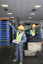 Two Multiethnic Men Working In Factory Royalty Free Stock Photo