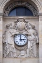 Two muses support the clock, topped by the coat of arms of Cardinal Richelieu, Saint Ursule chapel of the Sorbonne in Paris