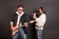 Two musicians on black background Royalty Free Stock Photo