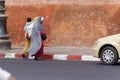 Two Muslim women crossing the street Royalty Free Stock Photo