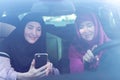 Two Muslim women travelling in the car Royalty Free Stock Photo