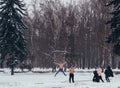 Two undressed young men enjoy the snow. Men with naked torsos jump in the snow in front of the cameras Royalty Free Stock Photo