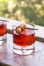 Two Negroni Cocktails Drinks with Orange Twist Royalty Free Stock Photo