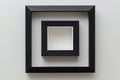 Two nested black frames blank white centers plain white background