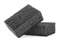 Two new absorbent black sponge isolated on white background. Black kitchen sponges