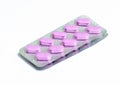 Two new packs of 10 pink oblong pills isolated on a white background Royalty Free Stock Photo