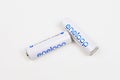 Two new Panasonic Eneloop rechargeable white AA batteries on a light background. October 16, 2022 Balti Moldova