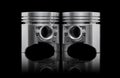 Two new pistons isolated on black background